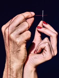 a person holding an electronic device in their hands