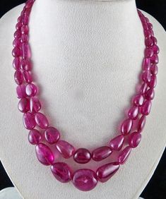 PRODUCT DETAILS 2 LINE /CTS 452 PINK TOURMALINE LONG BEADS   ALL NATURAL CERTIFIED BY LAB  SIZES OF THE BEADS FROM 20 MM TO 8.5 MM NECK LENGTH IS 16 INCHES OUTER LENGTH OF THE NECKLACE IS 18 INCHES   BEST QUALITY BEST PRICE NOTE - #You will receive the same product you see in picture. #DEAR ETSY BUYERS PLEASE FEEL FREE TO ASK QUESTIONS  #WE WILL BE GLAD TO ANSWER & SOLVE QUERY REGARDING THIS PRODUCTS #CONTACT US ON pansarijewels@gmail.com                                 #RETURN POLICY Every piece of jewellery and inputs (gem stones, diamonds, making and setting) is tested by our team of experts and experienced artisans to generate maximum satisfaction to our valued customers. Customer satisfaction is our primary goal. All information about the material used in jewellery, except for typogra Silk Cord, Gem Stones, Multi Strand Necklace, Natural Red, Strand Necklace, Multi Strand, Pink Tourmaline, Gemstone Necklace, Shop Earrings