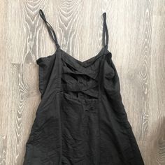 Cute Small Black Dress With Buttons And Criss-Cross Detail In The Back (Urban Outfitters) - No Tag, But Never Worn Summer Black Mini Dress By Urban Outfitters, Black Summer Mini Dress By Urban Outfitters, Urban Outfitters Black Mini Dress For Summer, Urban Outfitters Black Summer Mini Dress, Black Beach Dress From Urban Outfitters, Black Beach Dress By Urban Outfitters, Black Urban Outfitters Mini Dress For Summer, Casual Black Dresses By Urban Outfitters, Black Urban Outfitters Beach Dress