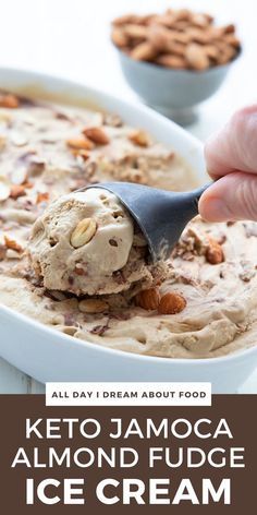 a person scooping ice cream out of a bowl with almonds on top and the words keto jamoca almond fudge ice cream