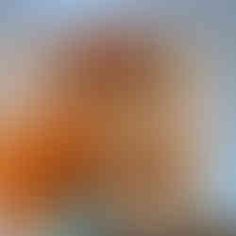 blurry image of an orange and blue background