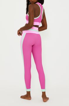 Sherbet-hued colorblock panels at the high waist and sides of these ultrasoft, ribbed second-skin leggings bring a sweet twist to a workout essential. Pull-on style 86% polyester, 14% spandex Machine wash, tumble dry Imported Sporty Color Block High Stretch Bottoms, Stretch Color Block Athleisure Bottoms, Stretch Color Block Bottoms For Athleisure, Compression Color Block Gym Bottoms, Sporty Yoga Bottoms With Color Block, Fitted Color Block Gym Bottoms, Compression Color Block Workout Bottoms, Compression Color Block Sports Bottoms, Fitted Color Block Sports Bottoms