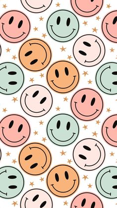 many different colored smiley faces on a white background, with stars in the sky behind them