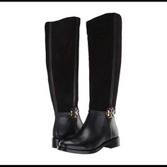 The Tory Burch 25 Mm Miller Boot Is A Sophisticated Knee-High Boot That Pairs Effortlessly With Midi Skirts And Dresses. It's Crafted With An Ultrasoft French Leather And Italian Suede Upper, And Detailed With The Signature Double-T Metal Logo. Side Zip Closure For Easy On And Off. Round Toe Gemini Link Jacquard Lining. Lightly Padded Footbed. Low Stacked Heel. Leather And Rubber Sole. Approx Measurements: Heel Height: 1 In Circumference: 15 In Shaft: 17 In Elegant Suede-lined Round Toe Boots, Elegant Boots With Suede Lining And Round Toe, Elegant Suede Almond Toe Boots, Designer Suede Boots For Work, Elegant Business Boots With Suede Lining, Elegant Almond Toe Boots With Suede Lining, Formal Boots With Leather Trim For Fall, Formal Fall Boots With Leather Trim, Formal Leather Trim Boots For Fall