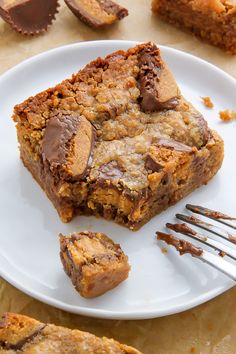 a white plate topped with chocolate chip cookie bars