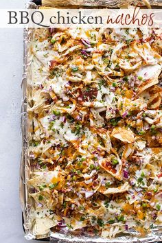 a casserole dish with chicken nachos in it