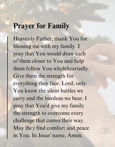 prayer for family on christmas tree with hand touching the top of its ornament