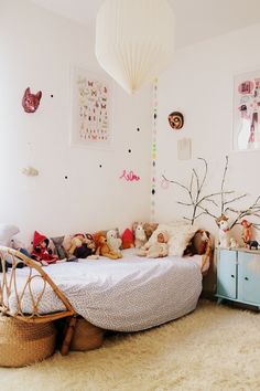 there is a child's room with toys on the floor