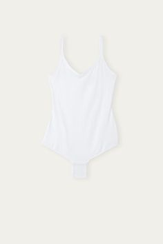 Tank style V-neck bodysuit in Supima® ultralight cotton. Snap button closure and 100% cotton inner gusset. Summer Cotton Solid Color Bodysuit, Classic Cotton Fitted Bodysuit, Stretch Cotton Bodysuit With Lined Body, Summer Loungewear Bodysuit With Built-in Bra, Cotton Loungewear Bodysuit, Cotton Short Sleeve Bodysuit, Basic Bodysuit For Loungewear In Spring, White V-neck Bodysuit For Loungewear, Summer V-neck Solid Color Short Sleeve Bodysuit