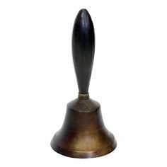 an antique brass bell with a black top on a white background, the bell has a pointed tip