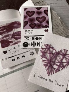 some cards with hearts and words on them