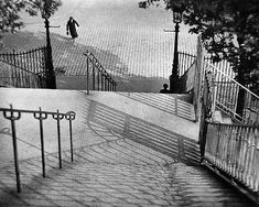 an old black and white photo of some stairs