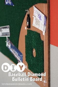 a baseball diamond bulletin board with magnets on it