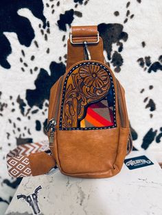 Custom tooled leather crossbody bag , perfect for traveling or everyday use!  This is a CUSTOM ITEM! include in message if you would like your bag with the pendleton fabric or without (fabric in photo is what i currently have)  Please message me before purchasing to come up with a design you would like on your bag and color you would like! Please choose a color of leather bag from photos listed. These are totally customizable for what you would like! Pendleton Fabric, Purse Patterns, Tooled Leather, Bag Travel, Custom Bags, Leather Tooling, Custom Items, You Bag, Sling Bag