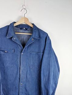 Vintage French Work Jacket Sanfor Blue Retro Indigo 60s Size: may fit M, see measurements Pit to pit: Back length: Sleeve length from neck to cuff: Good vintage condition, small hole, spots, see photo! Vintage Collared Denim Jacket For Winter, Retro Blue Outerwear With Snap Buttons, Retro Button-up Denim Jacket For Work, Retro Blue Outerwear With Buttons, Vintage Long Sleeve Denim Jacket With Buttons, Retro Denim Jacket With Snap Buttons, Retro Blue Outerwear With Pockets, Vintage Collared Outerwear With Button Closure, Vintage Collared Denim Jacket With Snap Buttons