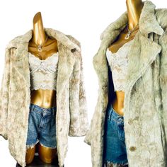 This Vintage 70s Hippie Boho Faux Fur Penny Lane Coat Is Cream In Color. The Winter Jacket Is Fully Lined And Looks To Be A Custom Made Piece. It Is Fashioned Of Faux Fur And Has A Front Button Up Closure With 2 Front Pockets. This Vintage Faux Fur Coat Is Hip Length And Is In Very Good Condition With Some Light Stains. It Is Marked Size Large. The Marked Brand Is "Baxis" Measurements: (Measurements Are Taken Of The Garment Laying Flat And Not Stretched) Bust: 48 Waist: 42 Length: 30" (From Shoulder To Hem) Shoulders: 25" Sleeve Length: 24" Cream Faux Fur Coat, Vintage Faux Fur Coat, Penny Lane Coat, Green Floral Blouse, Grunge Dress, 70s Hippie, Tent Dress, Penny Lane, Fake Fur