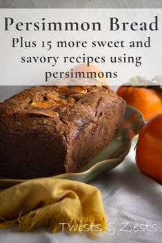 a loaf of bread sitting on top of a plate next to oranges and a napkin