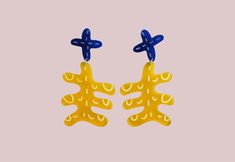 The most gloriously striking abstract earrings laser cut from vibrant frosted yellow acrylic. This abstract art inspired design feature dark blue cross shaped studs studs with contrasting yellow wiggly shaped charms. These earrings are assembled using sterling silver findings and are lovely & lightweight.  Measurements: Approx 8cm in length and up to 4.5cm in width. All my pierced earrings have sterling silver findings & earring posts. These earrings have featured in the Tate Galleries core jewe Modern Yellow Dangle Earrings, Artsy Yellow Earrings For Pierced Ears, Unique Yellow Pierced Earrings, Modern Yellow Earrings For Party, Artistic Yellow Drop Earrings, Unique Yellow Earrings, Modern Yellow Single Earring, Acrylic Earrings Laser Cut, One Woman Show