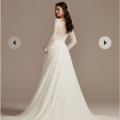 the back of a wedding dress with long sleeves