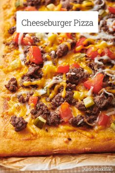 a cheesburger pizza is shown on a piece of parchment paper with the words cheeseburger pizza above it