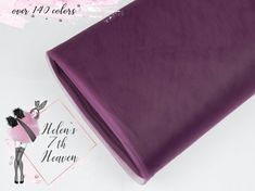 the fabric is purple and has a small black ballerina on it, along with an image of a woman in a pink dress