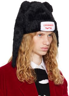 Faux-fur beanie in black. · Loose threads throughout · Ear appliqués at crown · Logo patch at rolled brim Supplier color: Black Charles Jeffrey Hat, Rabbit Beanie, Charles Jeffrey Loverboy, Charles Jeffrey, Crown Logo, Beanie Hats, Patch Logo, Hats For Men, Apparel Accessories