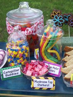 a table topped with lots of candy and candies