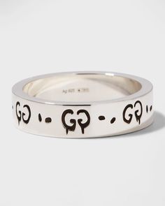 Gucci ring featuring engraved GucciGhost motifs..925 sterling silver..Approx. 0.2'W (6mm)..Made in Italy. Luxury Silver Jewelry With Engraved Logo, Gucci Sterling Silver Ring, Gucci White Gold Sterling Silver Ring, Classic Gucci Engraved White Gold Ring, Classic Gucci Engraved Ring As Gift, Classic Gucci Engraved Ring For Gift, Designer Gucci Rings With Polished Finish, Gucci Silver Sterling Silver Rings, Classic Gucci Engraved Ring For Anniversary