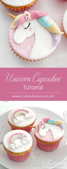 unicorn cupcakes with icing on them sitting on a plate