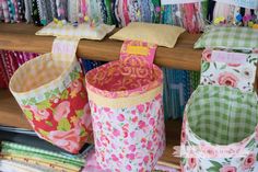 many colorful bags are on display in a store