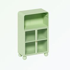 a green cabinet with two doors and wheels on the bottom, against a white background