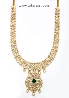 18 karat gold '3 in 1' diamond long necklace with color stones & south sea pearls
  this product has inter changeable stones in the necklace and pendant. 
   this product has a detachable pendant which can be used as a separate pendant with most chains.
  length of the pendant : 2.85 inches
  width of the pendant : 1.85 inches  

     

introducing the exquisite 18 karat gold '3 in 1' diamond long necklace with color stones & south sea pearls, a true masterpiece crafted by totaram jewelers in in Diamond Long Necklace, Detachable Pendant, Diamond Choker Necklace, Color Stones, Gold Jewelry Indian, South Sea Pearls, Sea Pearls, Stunning Necklace, Indian Jewelry