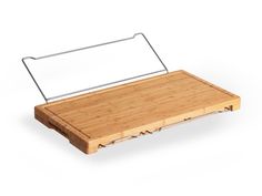 a wooden cutting board with a metal handle