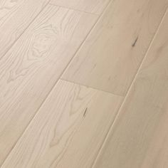 an image of white wood flooring that looks like it has been cleaned