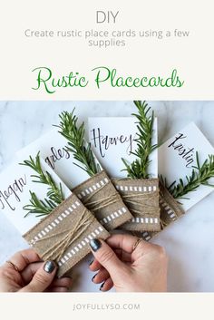 handmade rustic place cards are tied with twine and decorated with greenery on them