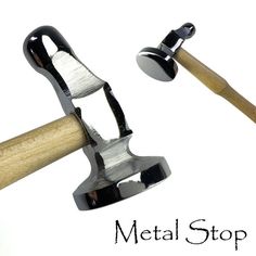 two metal hammers with wood handles on them and the words metal stop written below