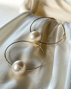 Luna Pearl Hoops - bijoulimon.com Classic Round Hoop Earrings For Party, Modern Pearl Hoop Earrings For Wedding, Pearl Hoop Earrings For Party, Chic Pearl Hoop Earrings For Party, Chic Pearl Hoop Earrings, Chic Pearl Hoop Jewelry, Chic Pearl Drop Hoop Earrings, Chic Hoop Pearl Earrings With Pearl Charm, Formal Hoop Earrings With Pearl Charm