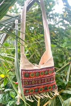 Embroidered Natural Tote Shoulder Bag, Folk Style Multicolor Embroidered Shoulder Bag, Folk Style Embroidered Multicolor Shoulder Bag, Traditional Multicolor Embroidered Floral Bag, Traditional Floral Embroidered Tote Bag, Bohemian Embroidered Cotton Shoulder Bag, Traditional Tote Bag With Floral Embroidery, Embroidered Beige Shoulder Bag For Festivals, Traditional Floral Embroidered Bag For Festival