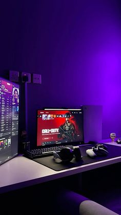 a desktop computer sitting on top of a white desk next to a monitor and keyboard