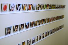 a wall with many pictures on it