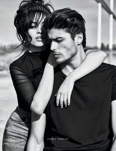 a man and woman are posing together in black and white, with the caption caciliolan