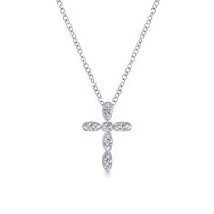 Express your faith in style with a timeless religious emblem. Six round cut diamonds nestled in 14k white gold milgrain frames form a lovely cross pendant. This .09ct diamond necklace is as meaningful as it is beautiful. 14k White Gold Segmented Diamond Cross Necklace | NK2210W45JJ Engagement Rings | Fashion Jewelry | Gabriel NY White Gold Cross Necklace, Diamond Cross Necklace Gold, Diamond Cross Necklace, Marquise Shape Diamond, Gold Cross Necklace, Rings Fashion, Diamond Cross Pendants, Diamond Cross, Three Stone Engagement Rings