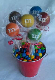 a bucket filled with m and m candies