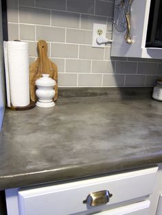 a kitchen counter top that has been painted white