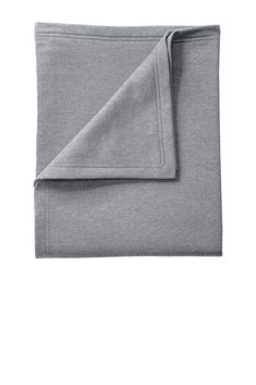 a folded gray blanket on a white background