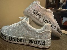 Custom rhinestoned sneakers! Add your name, school, organization, pageant title, wedding date/new last name, bride/bridesmaid, or other custom title or phrase to these snazzy sneakers! Covered in clear and AB rhinestones with the words in black rhinestones, each stone is individually hand-placed around the sole of the shoe. Please specify: 1. the words/phrase/title you want with exact spelling 2. placement preference on the inside of the shoe (big toe side) or outside of the shoe (pinky toe side) 3. US women's shoe size  Words/phrase will be the same on both shoes.  Perfect for nights out, special events, elevating casual styles, and making you the star of the show! Please allow extra time for this item since: - Shoes are not kept in stock and therefore must be ordered specifically for you Custom Wedding Sneakers With Rhinestones, Wedding Custom Sneakers With Rhinestones And Round Toe, Lace-up Sneakers With Rhinestones For Anniversary, Wedding Low-top Sneakers With Rhinestones, Shoes Custom, Casual Styles, Sneakers Athletic, School Organization, Wedding Date