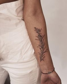 a person with a tattoo on their arm