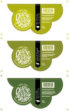 three green labels with the words, one is for olive sauce