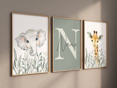 three baby nursery prints with an elephant, giraffe and letter n on them