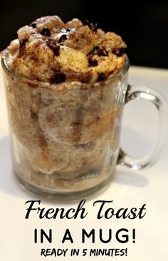 a glass mug filled with baked goods on top of a white table next to an instagram page